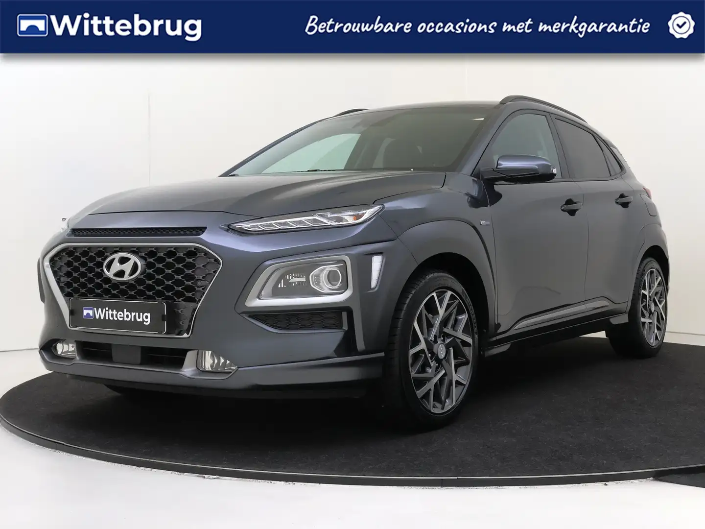 Hyundai KONA 1.6 GDI HEV Premium | Automaat | Trekhaak | Lichtm Gris - 1