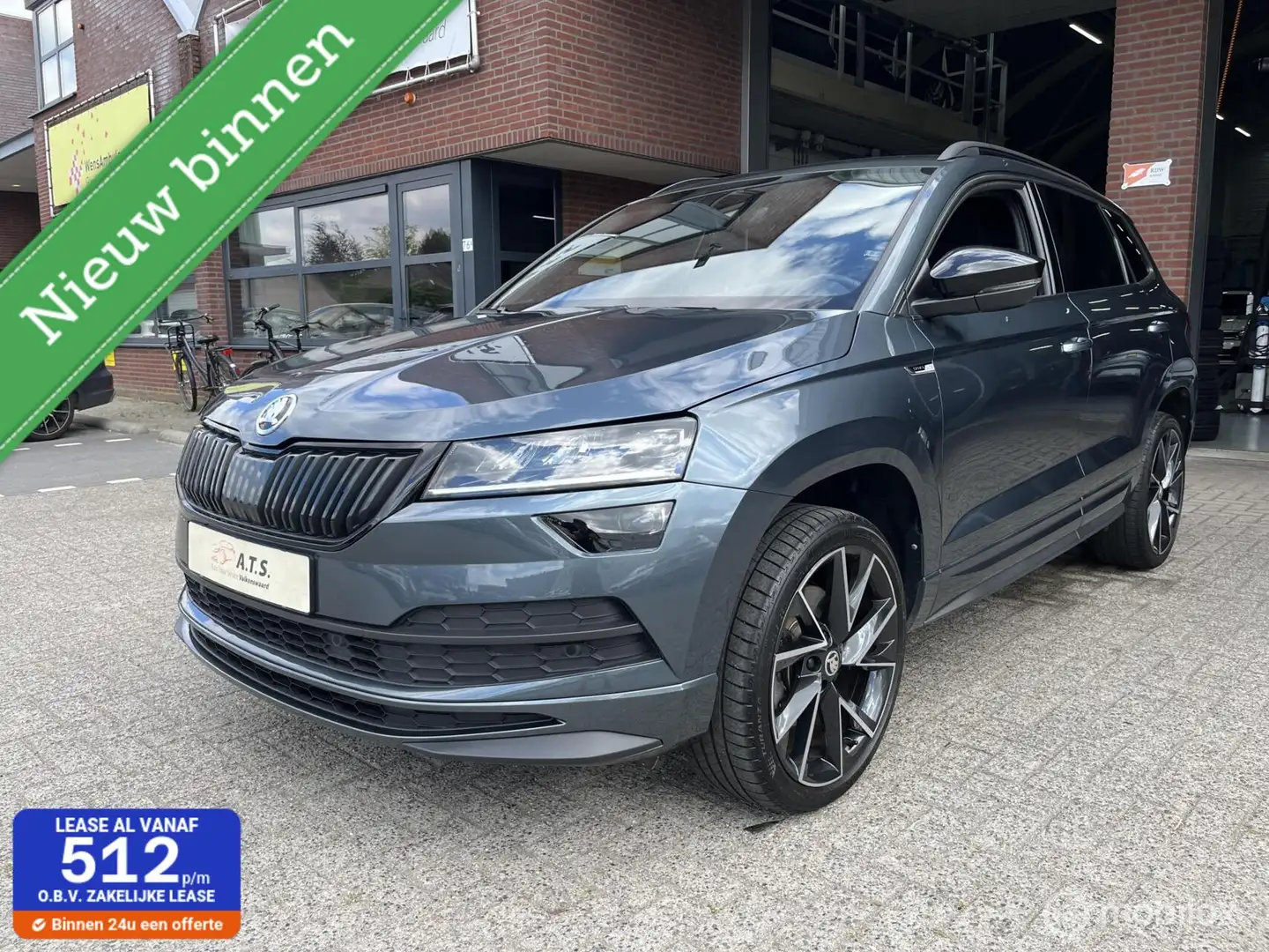 Skoda Karoq 1.5 TSI ACT Sportline LED*ACC*TREKHAAK*CAMERA* Grijs - 1