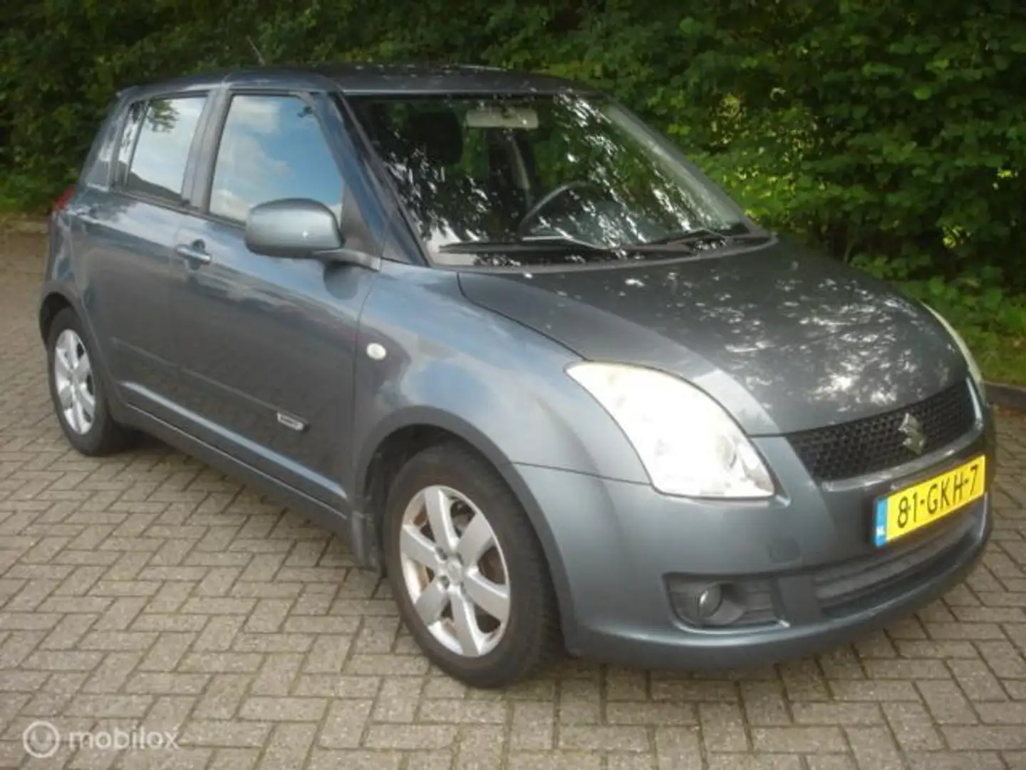 Suzuki Swift 1.3 I 16V Comfort Airco Versnelling 2 defect. Gris - 1