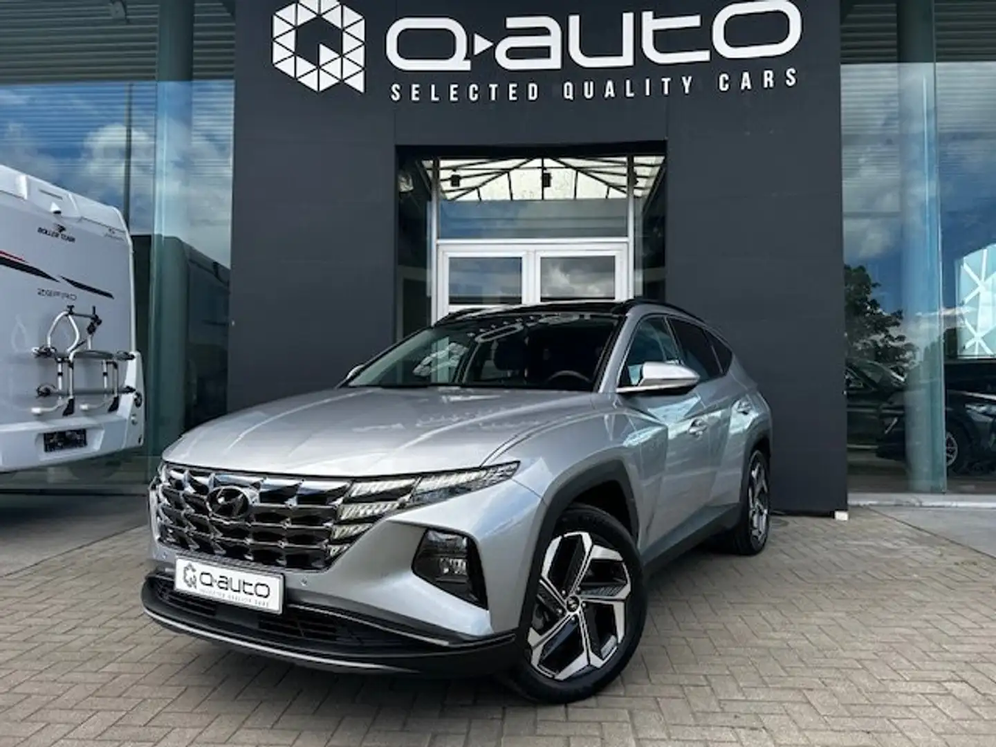 Hyundai TUCSON 1.6 T-GDi Plug-in-Hybrid 4WD / Pano Dak / Trekhaak Gri - 1