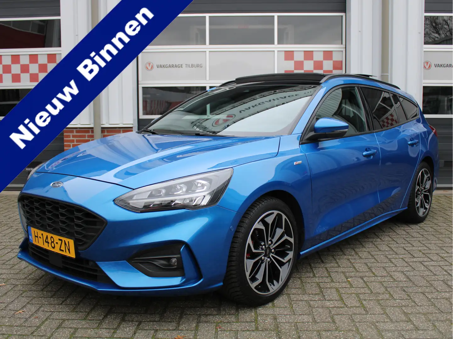 Ford Focus Wagon 1.0 EcoBoost ST Line Business 1e Eig/ Dealer Blauw - 1