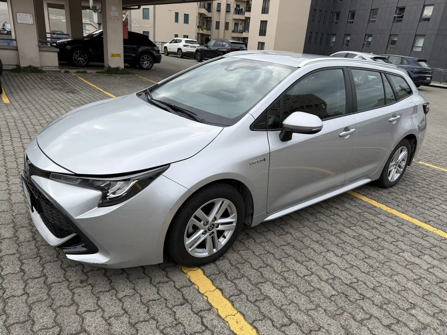 Toyota Corolla 1.8 Touring Sports SW Hybrid IBRIDA Business Argento - 1