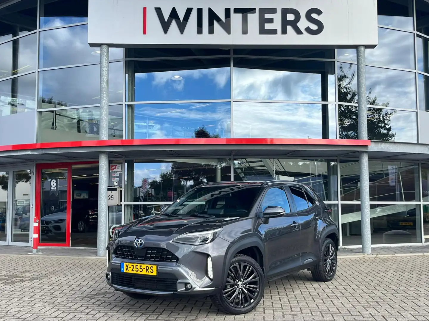 Toyota Yaris Cross 1.5 Hybrid AWD-i Executive | Navigatie | Adaptive Gris - 1