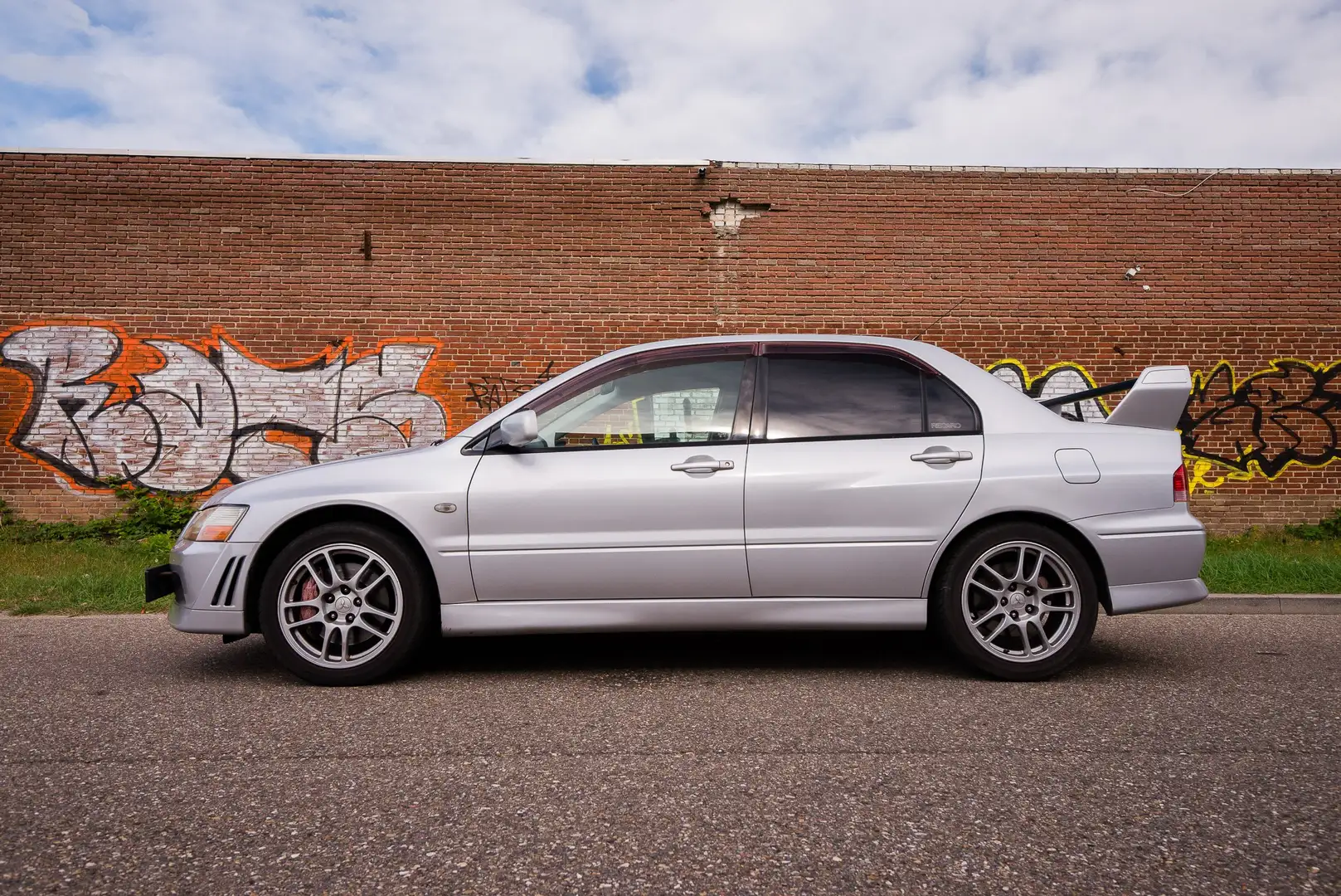 Mitsubishi Lancer Evo Evolution VII 2.0 GSR Серебристый - 1