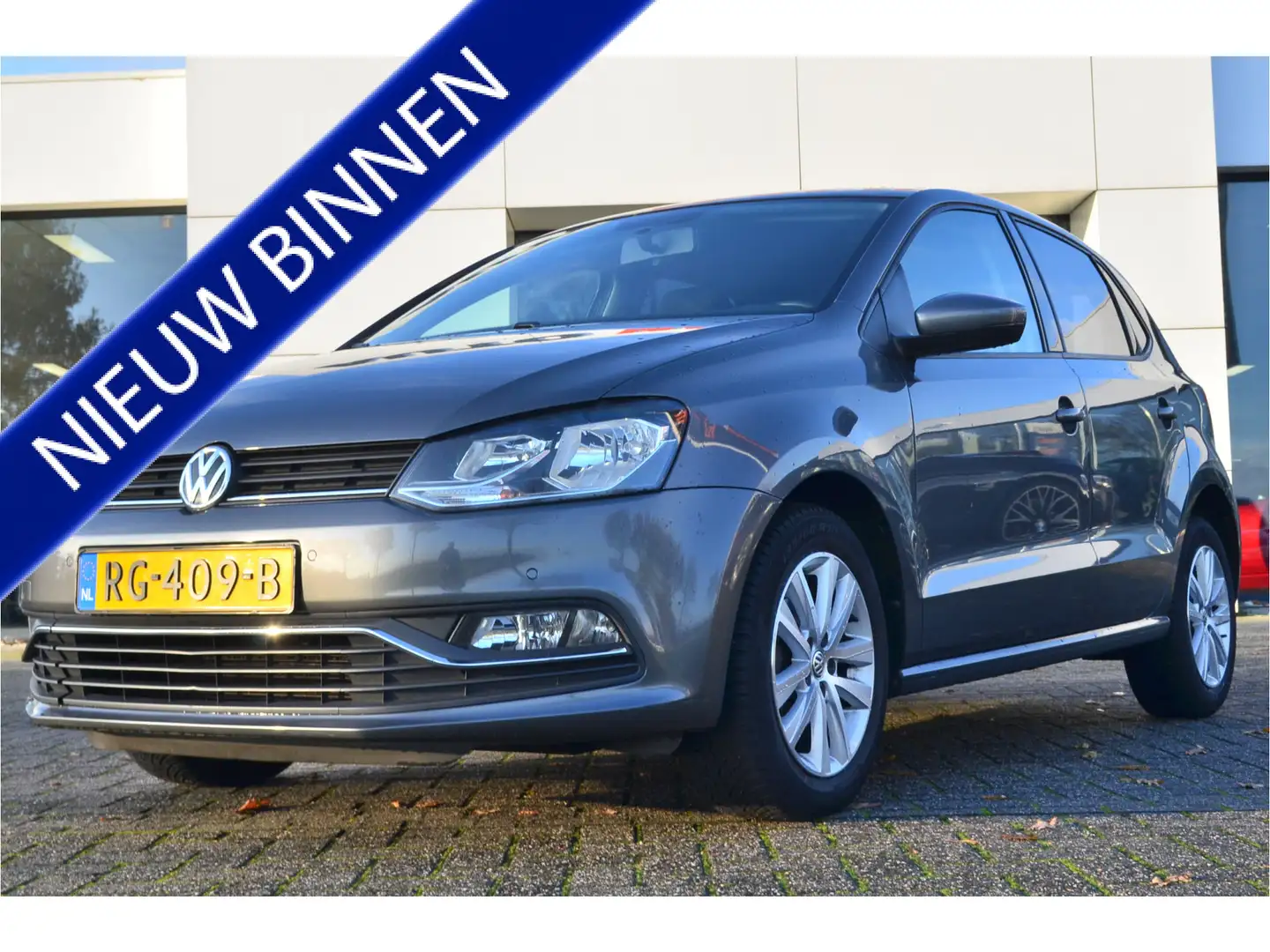 Volkswagen Polo 1.2 TSI 4 Cil. Comfortline Carplay | Parkeersensor Gris - 1