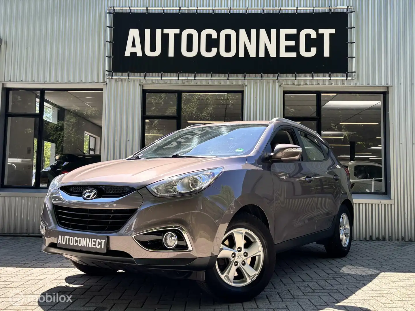 Hyundai iX35 2.0i. NAVI, CAMERA, CLIMA, STOELVERWARMING Bruin - 1