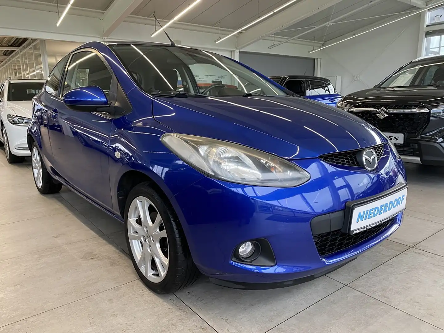 Mazda 2 1.3 Impression KLIMAAUT. Sitzhzg Blau - 1