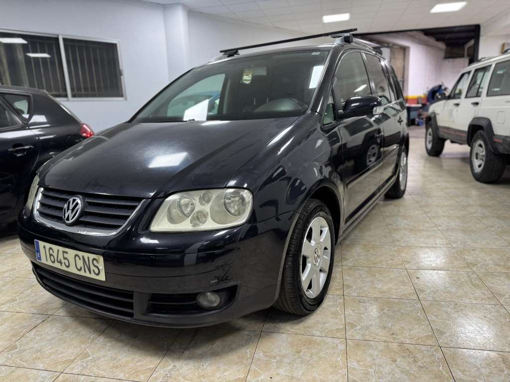 Volkswagen Touran 2.0TDI Highline - foto 1