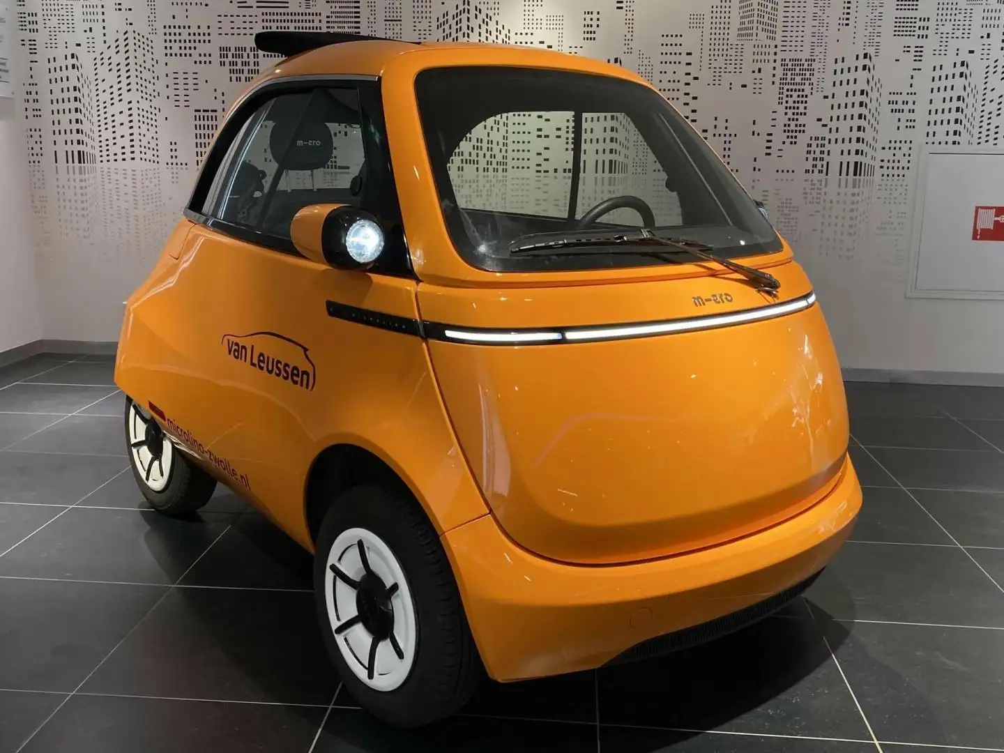 Micro Microlino COMPETIZIONE 10.5 kWh 100% ELEKTRISCH UNIEK EYECAT Portocaliu - 1