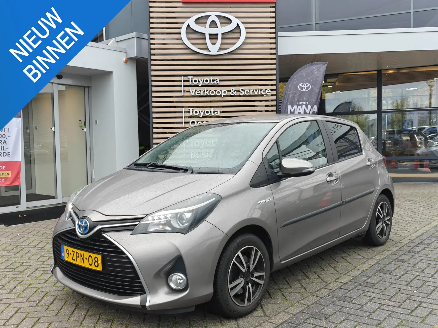 Toyota Yaris 1.5 HYBRID LEASE 5-DEURS NAVI BLUETOOTH CAMERA CRU Brun - 1
