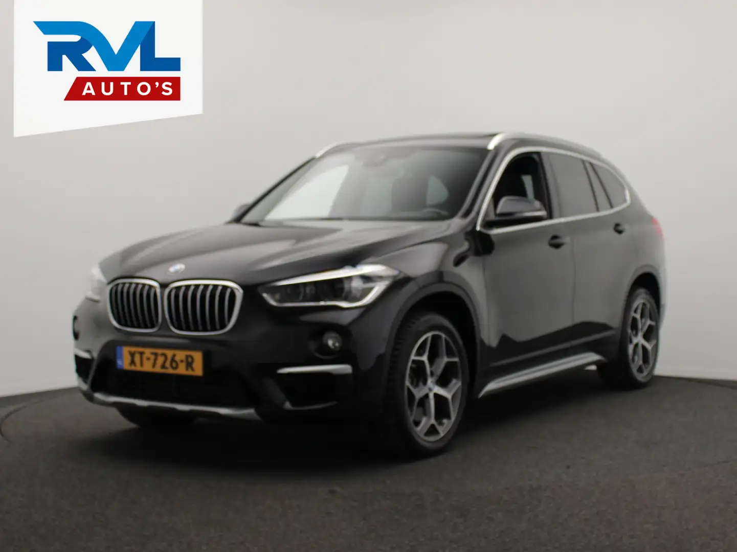BMW X1 SDrive20i High Executive Pano/dak Sport/leder Head Zwart - 1