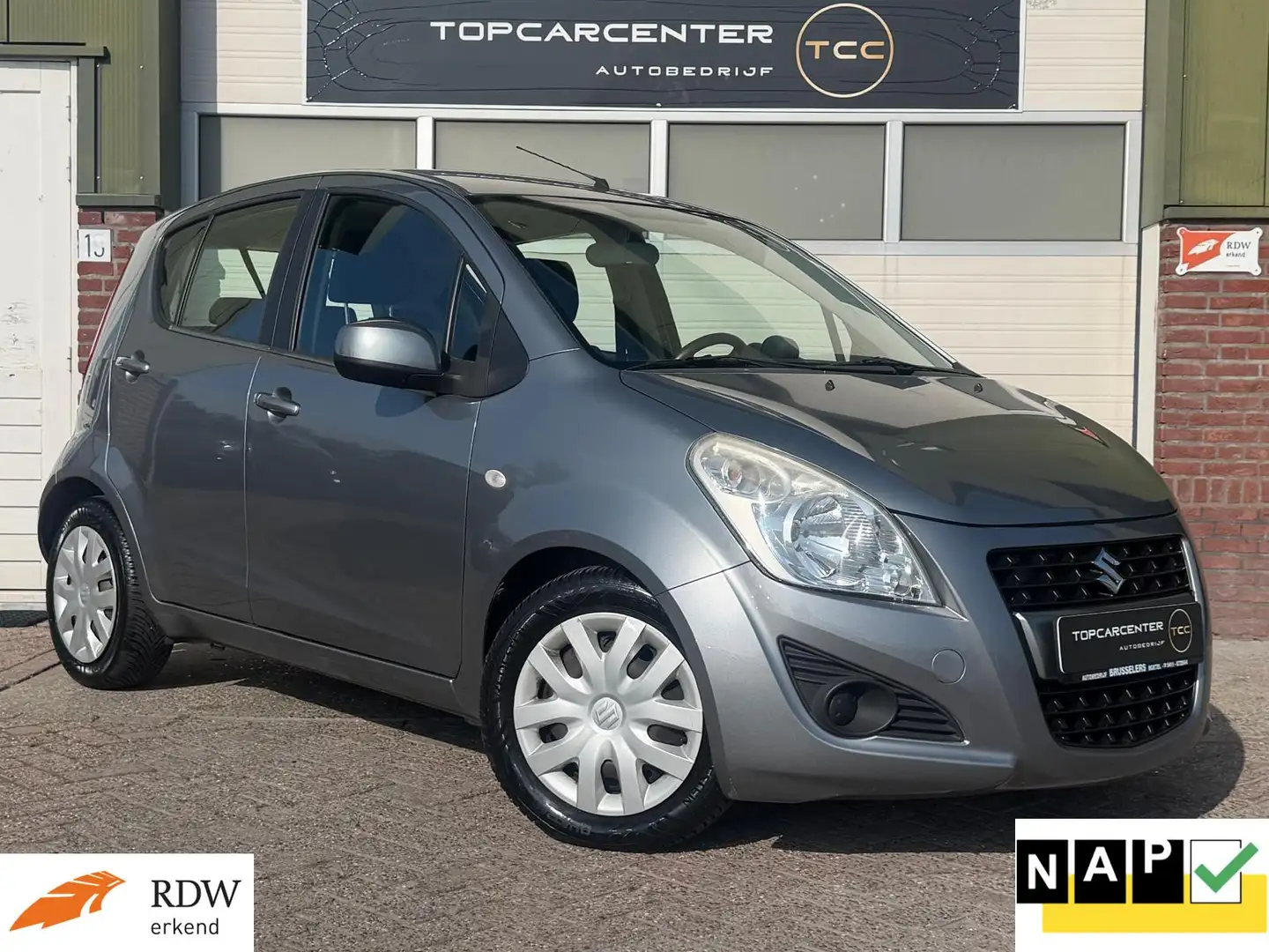 Suzuki Splash 1.2 Comfort/AIRCO/AUT/CRUISE//APK/NAP/1E EIG. Grau - 1