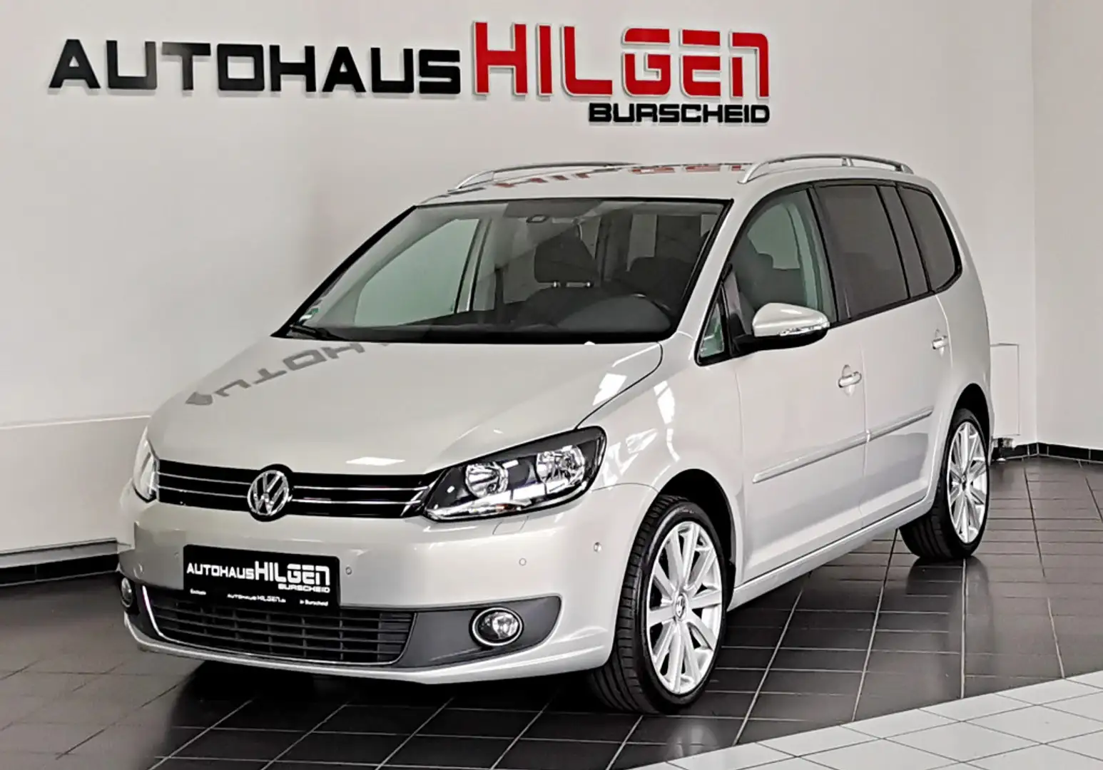 Volkswagen Touran Highline DSG*7Sitze*R.Kamera*AHK*Navi*SHZ Silber - 1