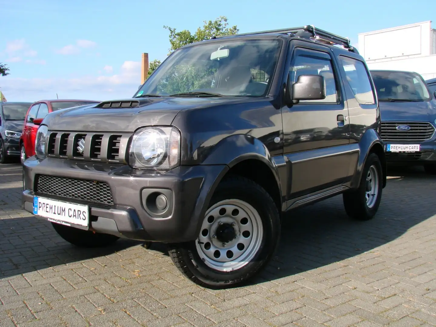 Suzuki Jimny 1.3 Allgrip 4-Sitzer Klima Sitzheizung AHK Grau - 2