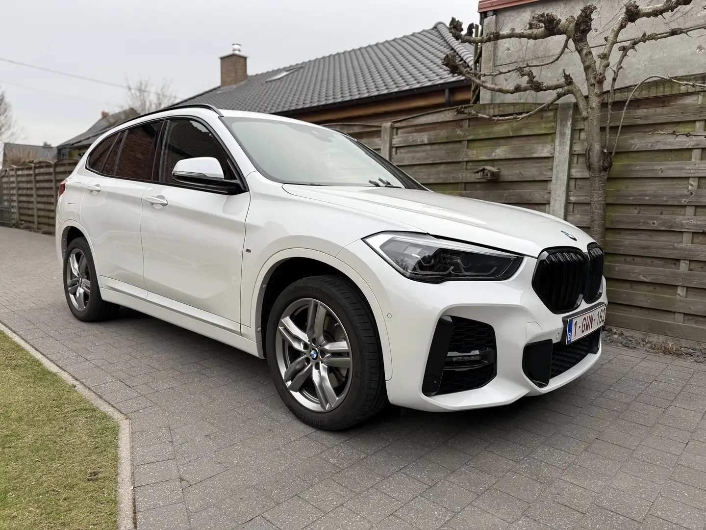 BMW X1 sDrive20i Aut. M Sport - BMW GARANTIE tot 12-2025 Blanc - 1