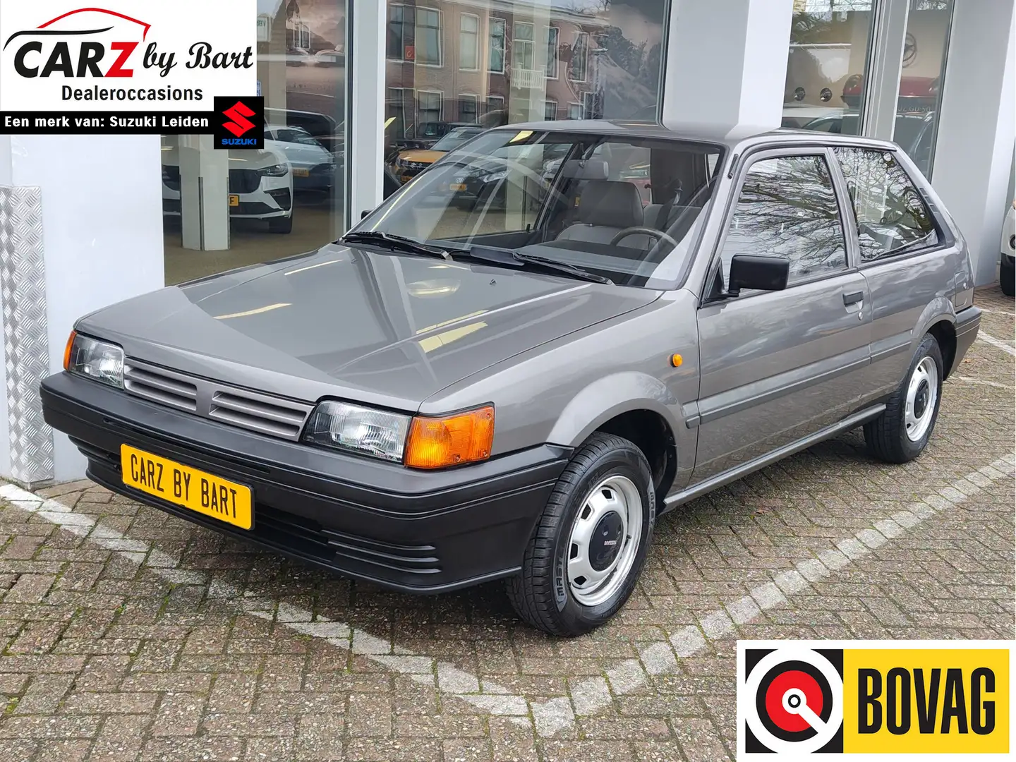Nissan Sunny 1.3 LX AUTOMAAT Lage kmstand! | Nieuwe APK! | Zeer Gris - 1