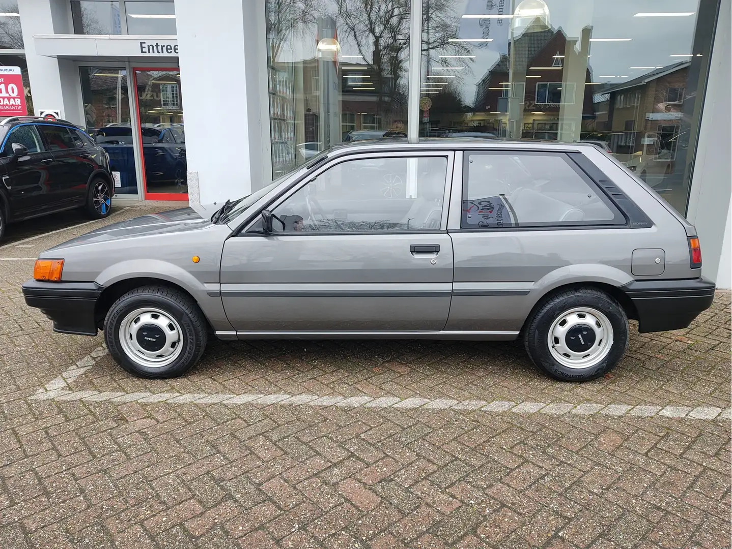 Nissan Sunny 1.3 LX AUTOMAAT Lage kmstand! | Nieuwe APK! | Zeer Gris - 2