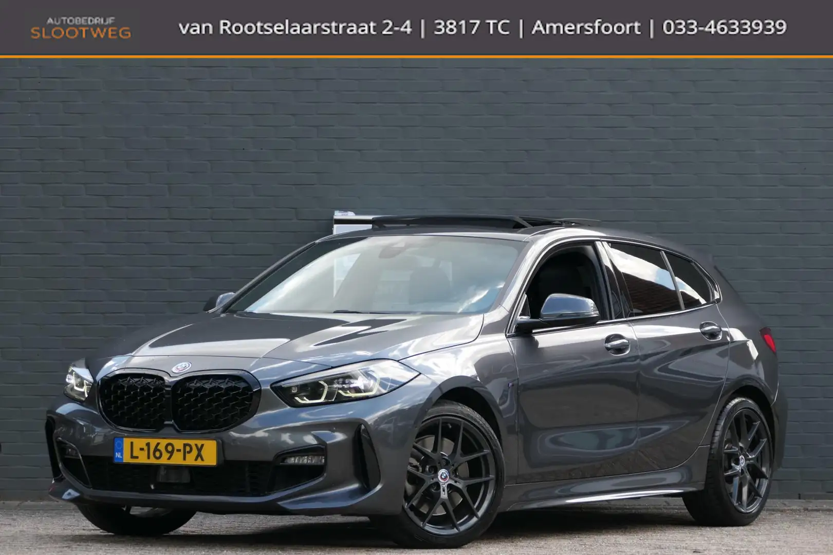 BMW 120 1-serie 120i High Executive M-Sport | Panoramadak Grijs - 1
