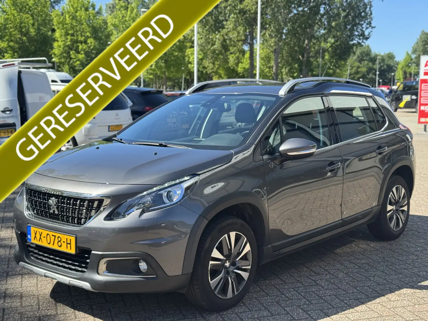 Peugeot 2008 82pk Allure Camera|Navigatie|1ste eigenaar! Gris - 1