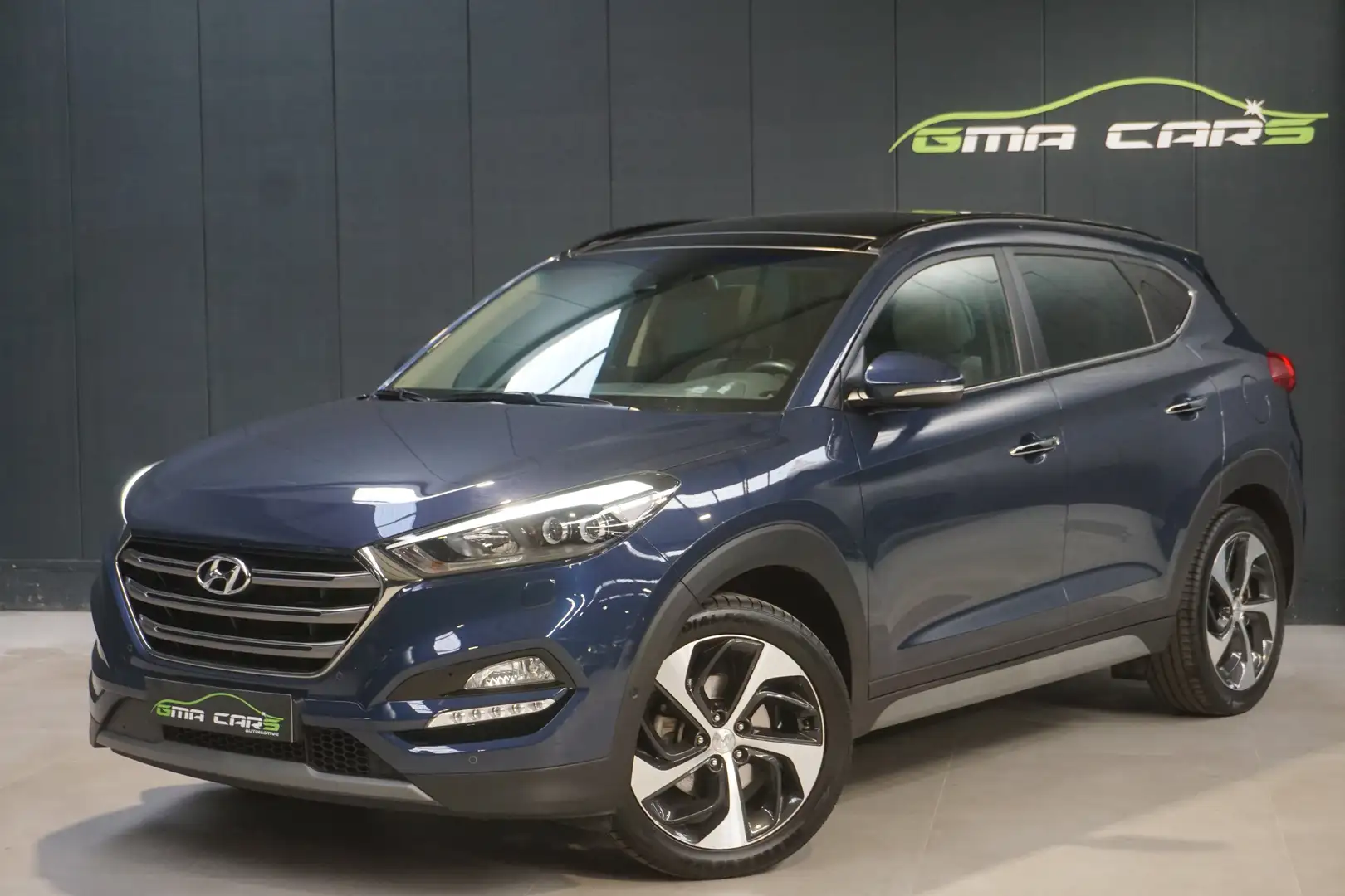 Hyundai TUCSON 1.6 Turbo 2WD Benzine-Airco-Navi-Pano-Garantie Blauw - 1