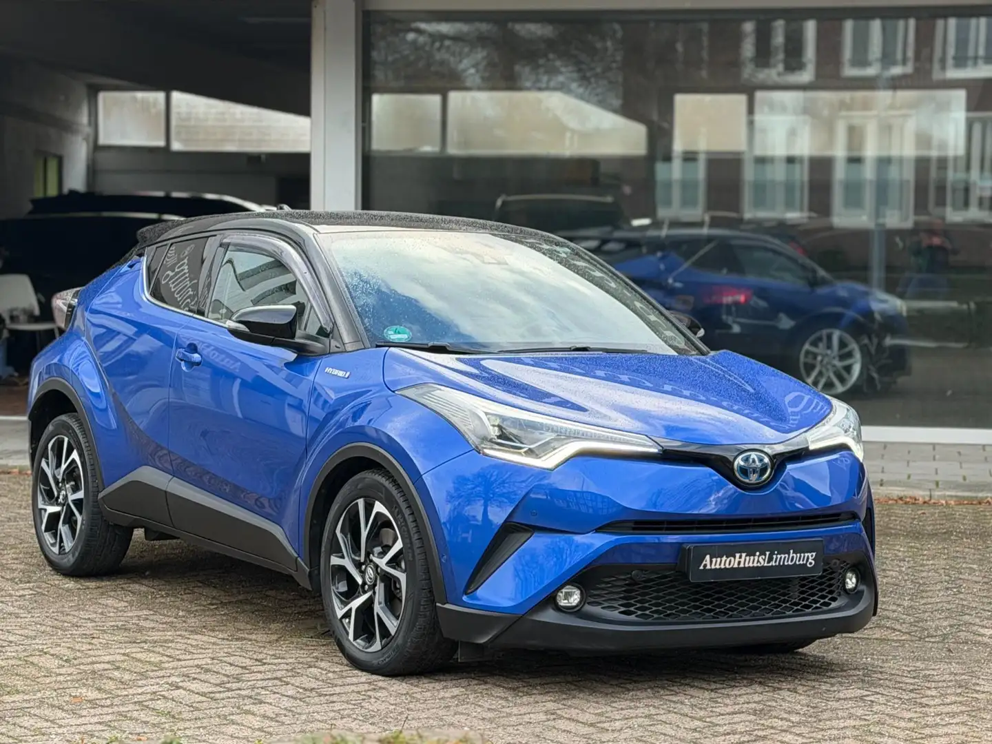Toyota C-HR 1.8 Hybrid Bi-Tone Plus|Nieuwstaat!|1e Eigenaar|Ca Bleu - 1