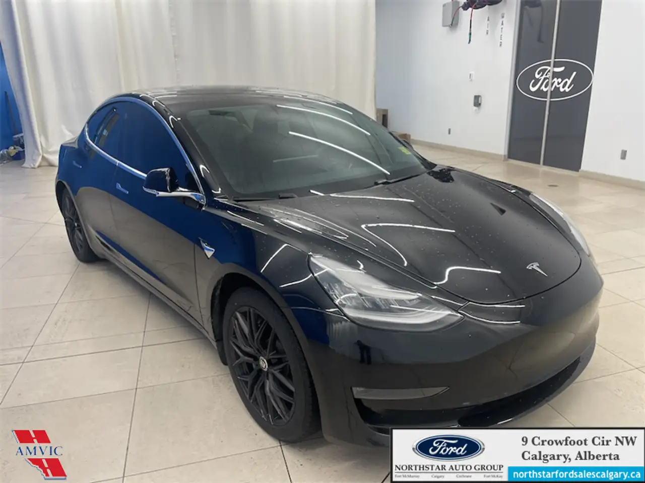 Tesla Model 3 photo Tesla Model 3