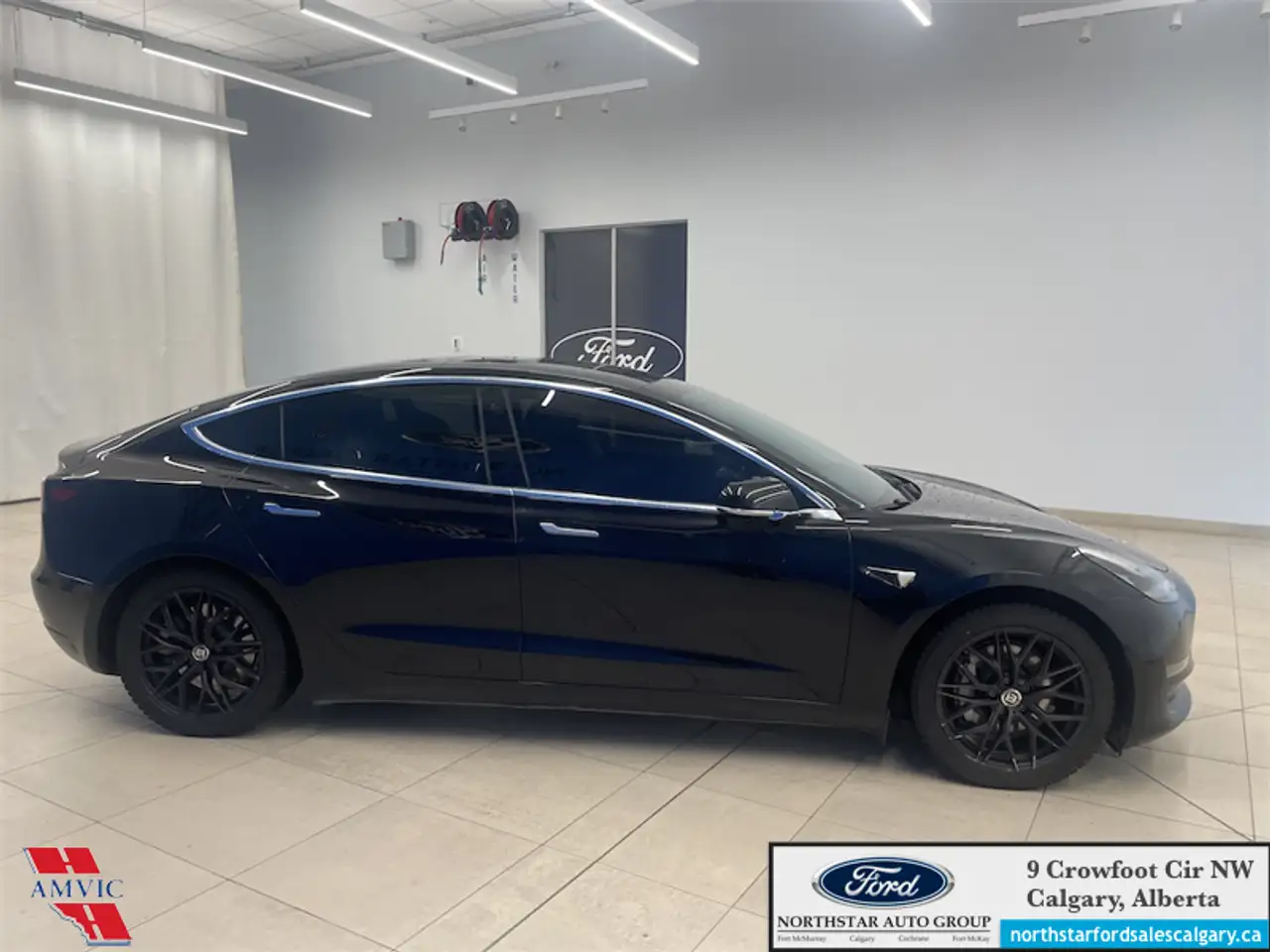 Tesla Model 3 photo Tesla Model 3