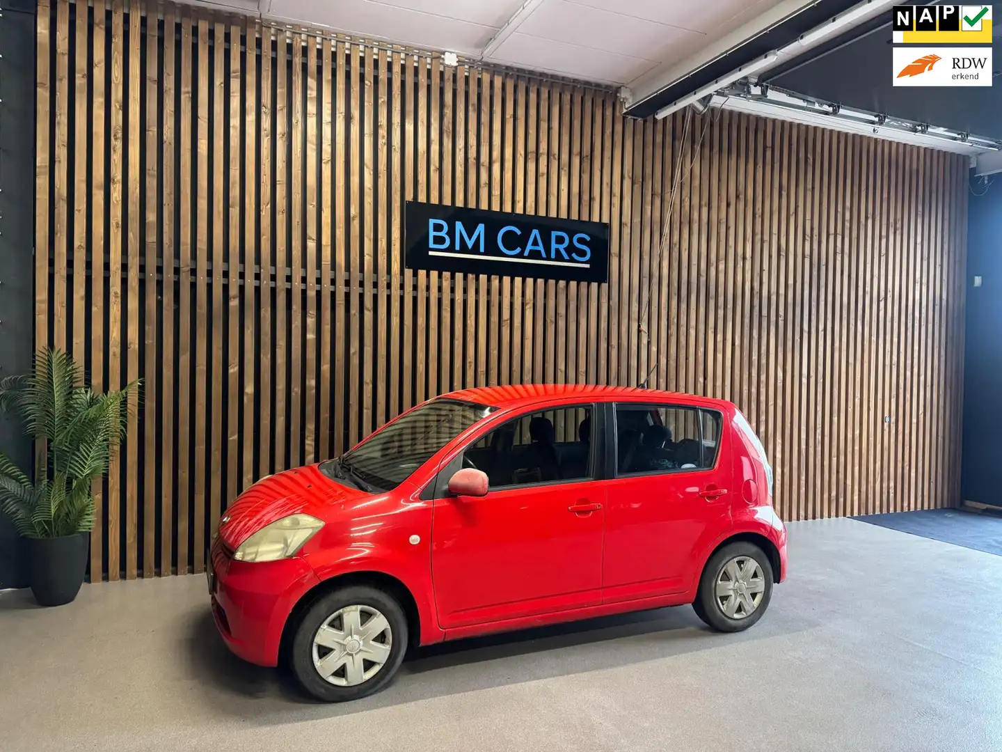 Daihatsu Sirion 2 1.0-12V Trend Rood - 1