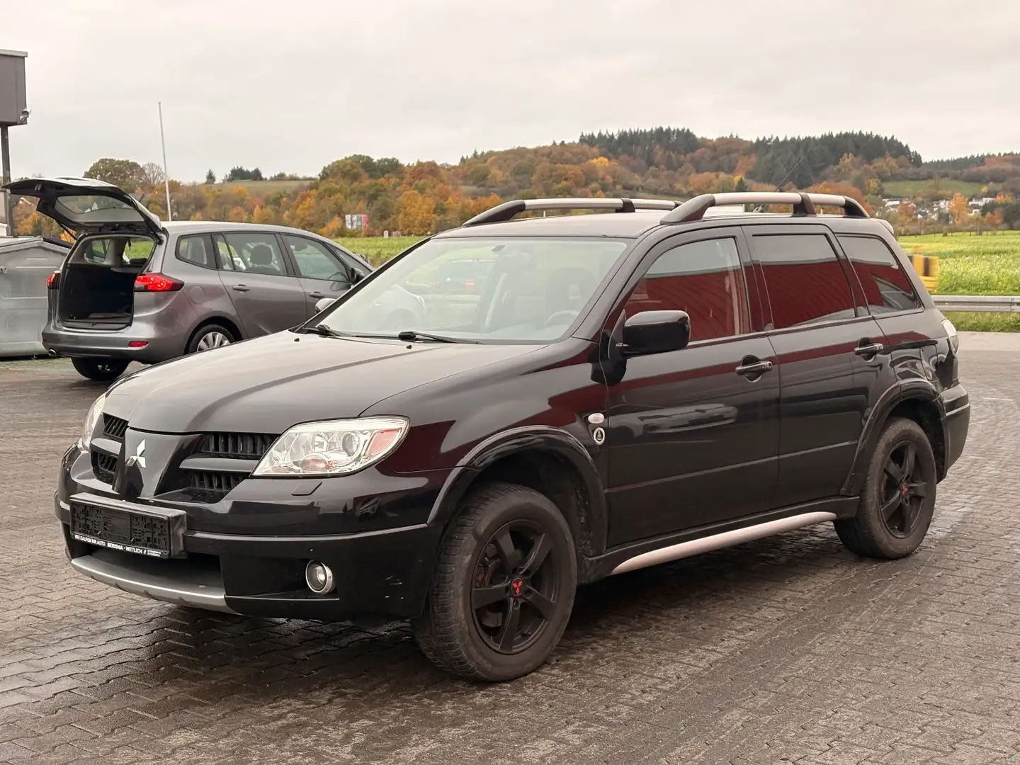 Mitsubishi Outlander 2.4 Allrad Klima S+W Reifen Noir - 1