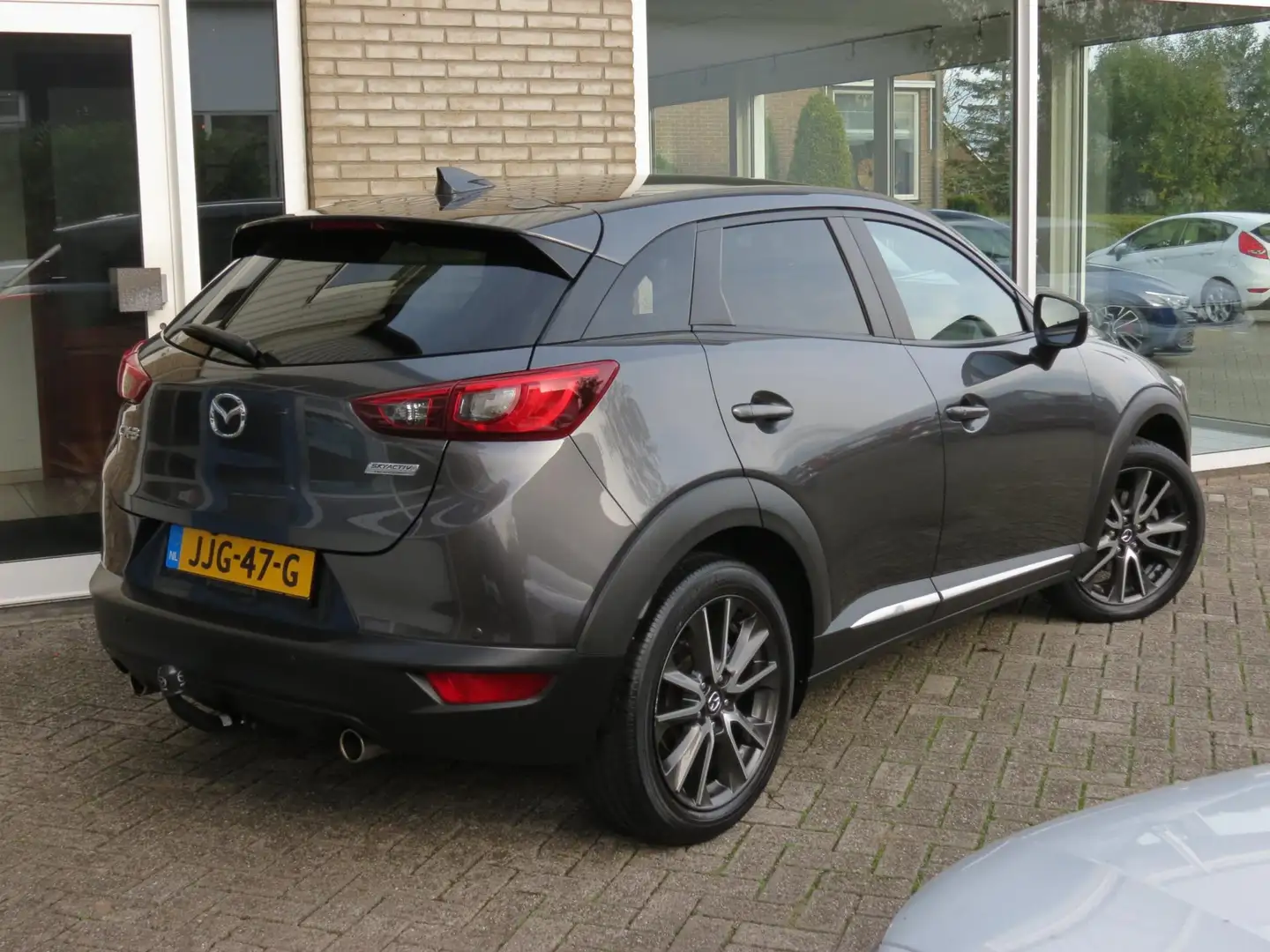 Mazda CX-3 2.0 SkyActiv-G 120 GT-M Camera|Vol Leder|Navi|Trek Grijs - 2