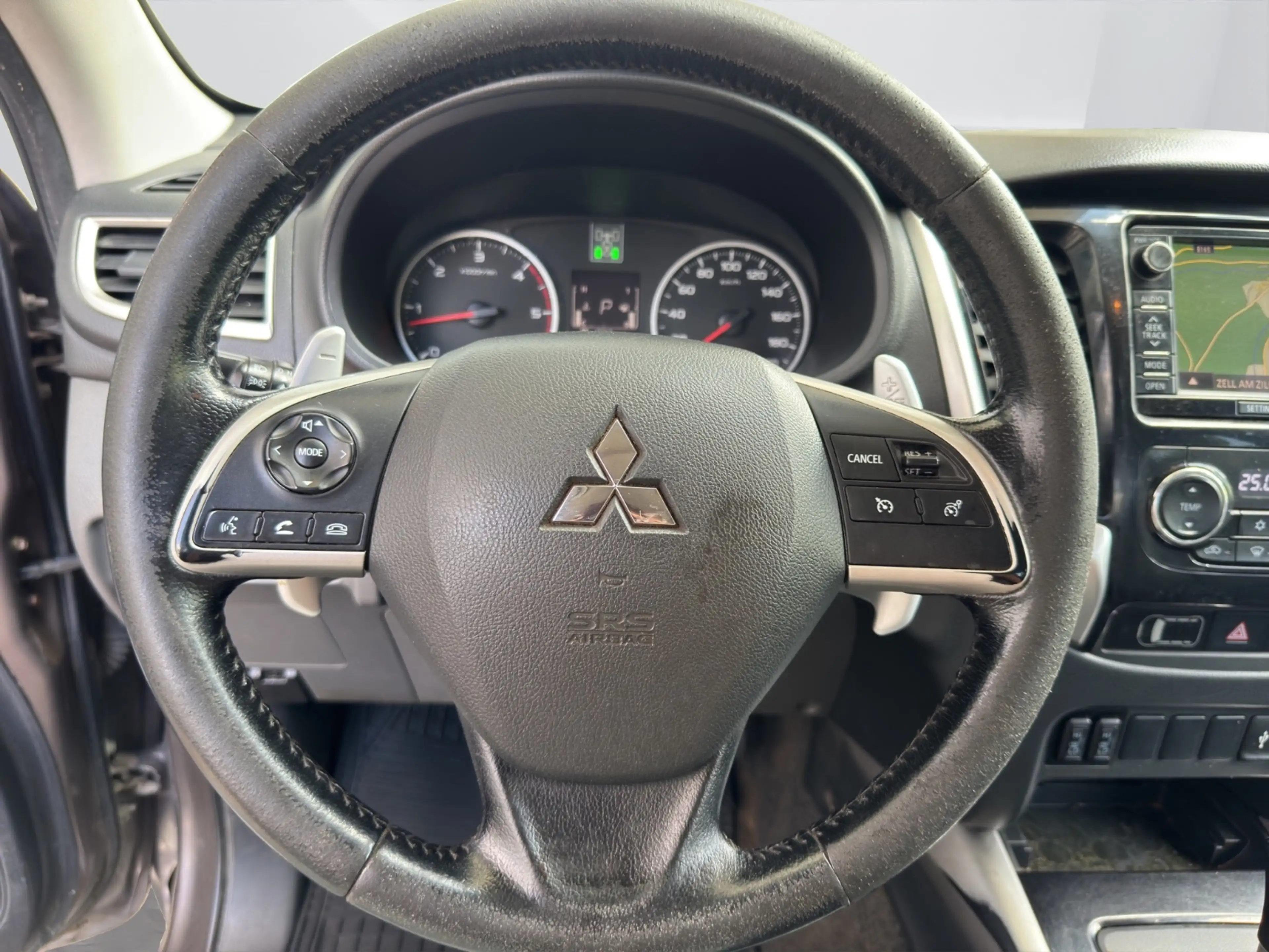 Mitsubishi L200 — photo 11