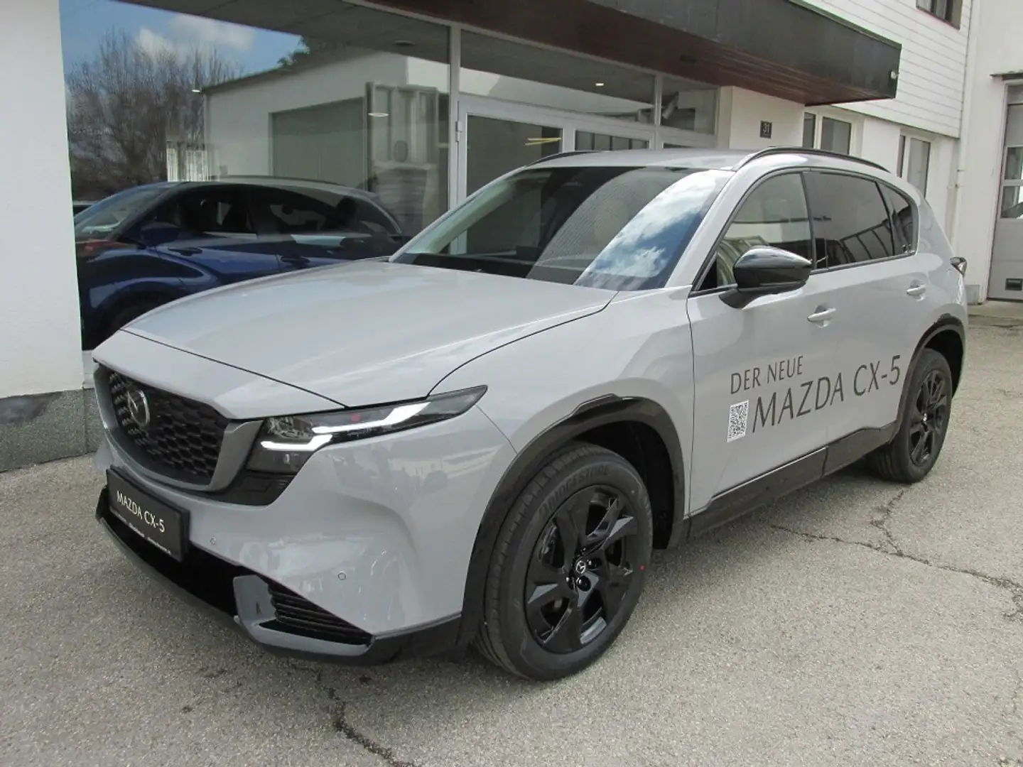 Mazda CX-5 e-Skyactiv G141 MHEV AWD Homura Aut. Grau - 1