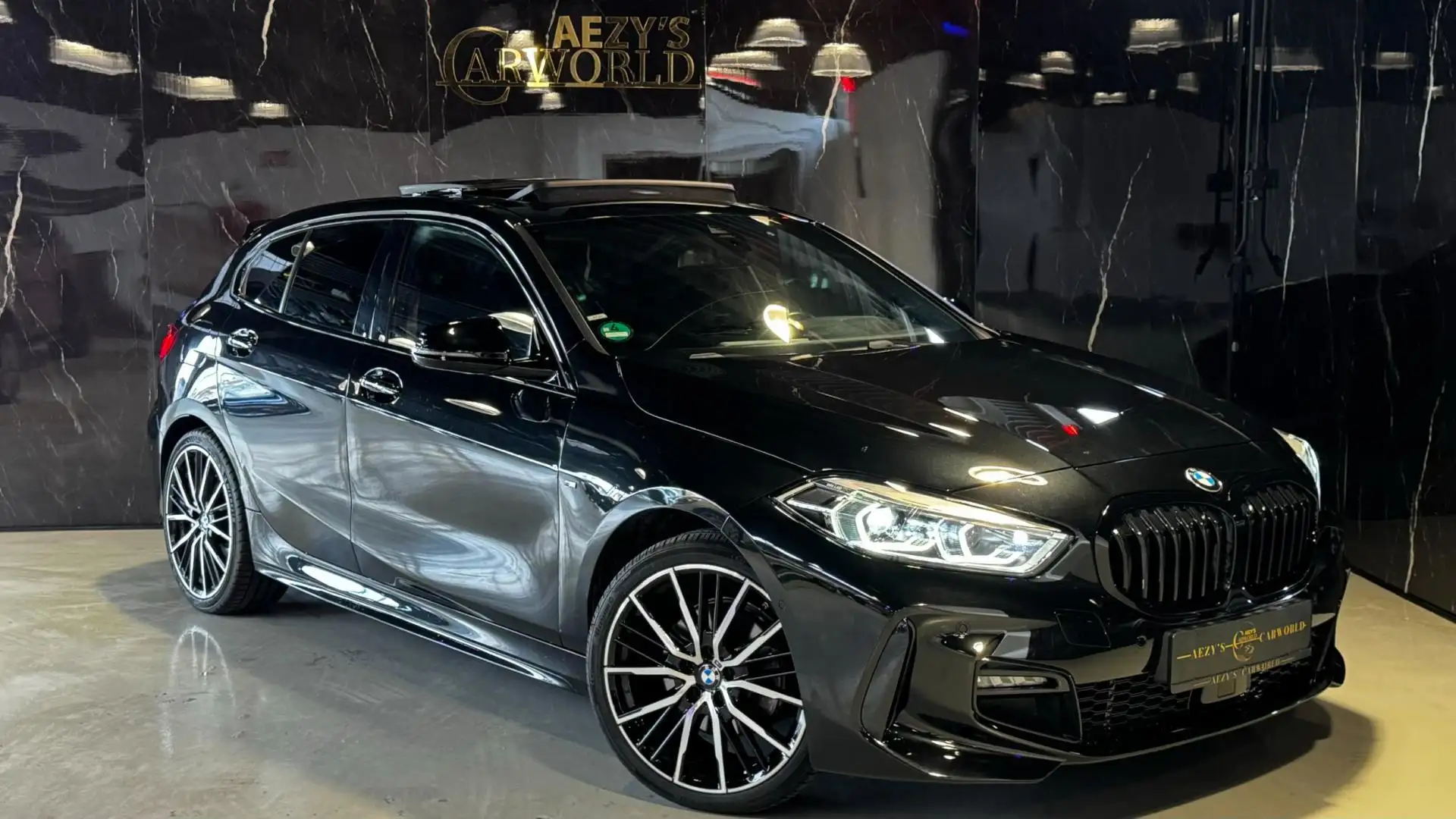 BMW 118 1-serie 118i M-Sport PANO|HUD|SFEER|KUIP|CAM| VOL Schwarz - 2
