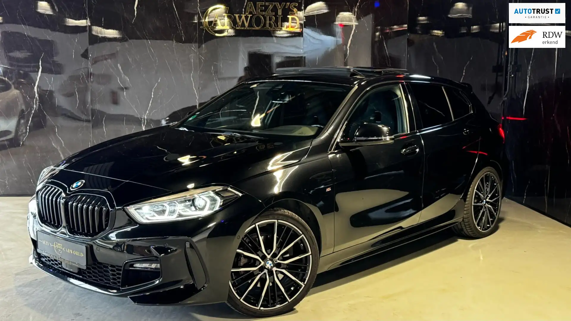 BMW 118 1-serie 118i M-Sport PANO|HUD|SFEER|KUIP|CAM| VOL Schwarz - 1