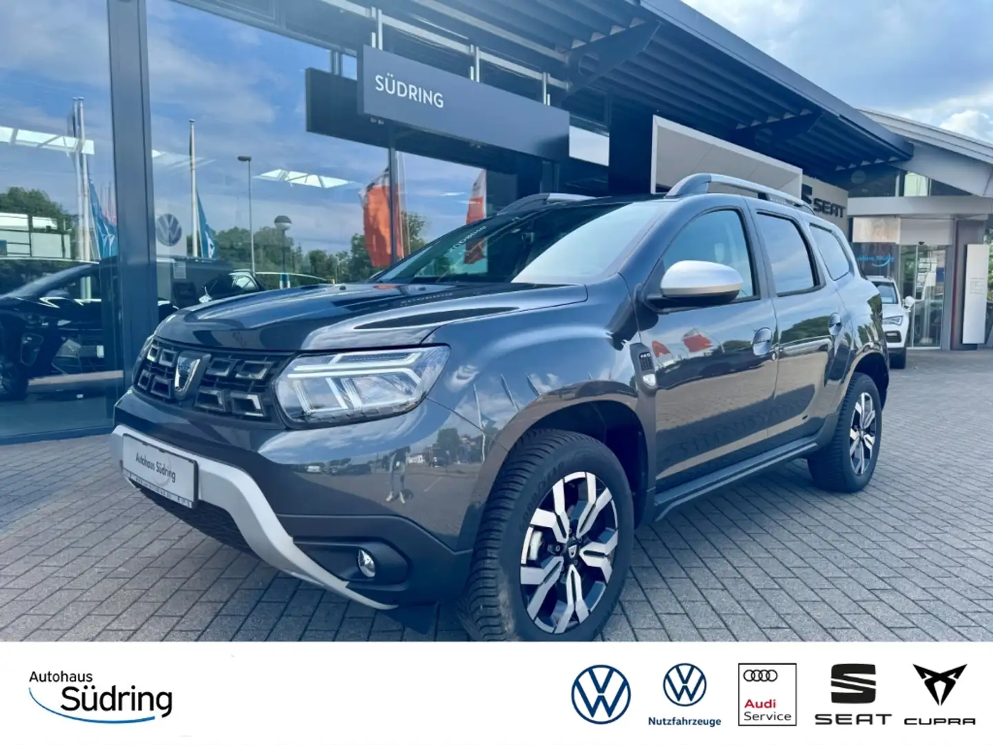 Dacia Duster II 1.3TCe 150 Prestige 4WD Navi Leder 360 Kamera Grijs - 1