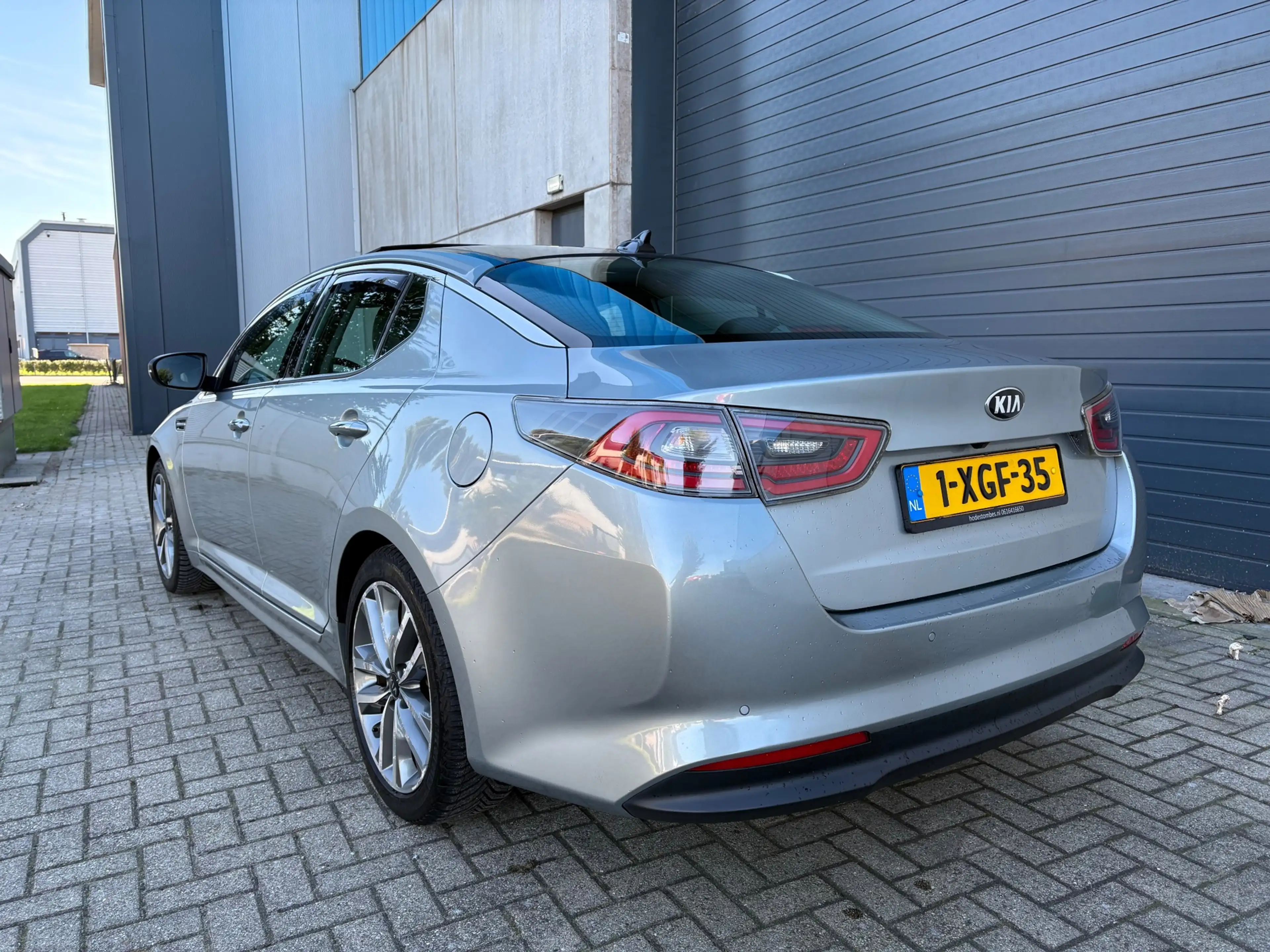 Kia Optima 2.0 CVVT Hybrid Executive Line AUT PANO LEDER — photo 4