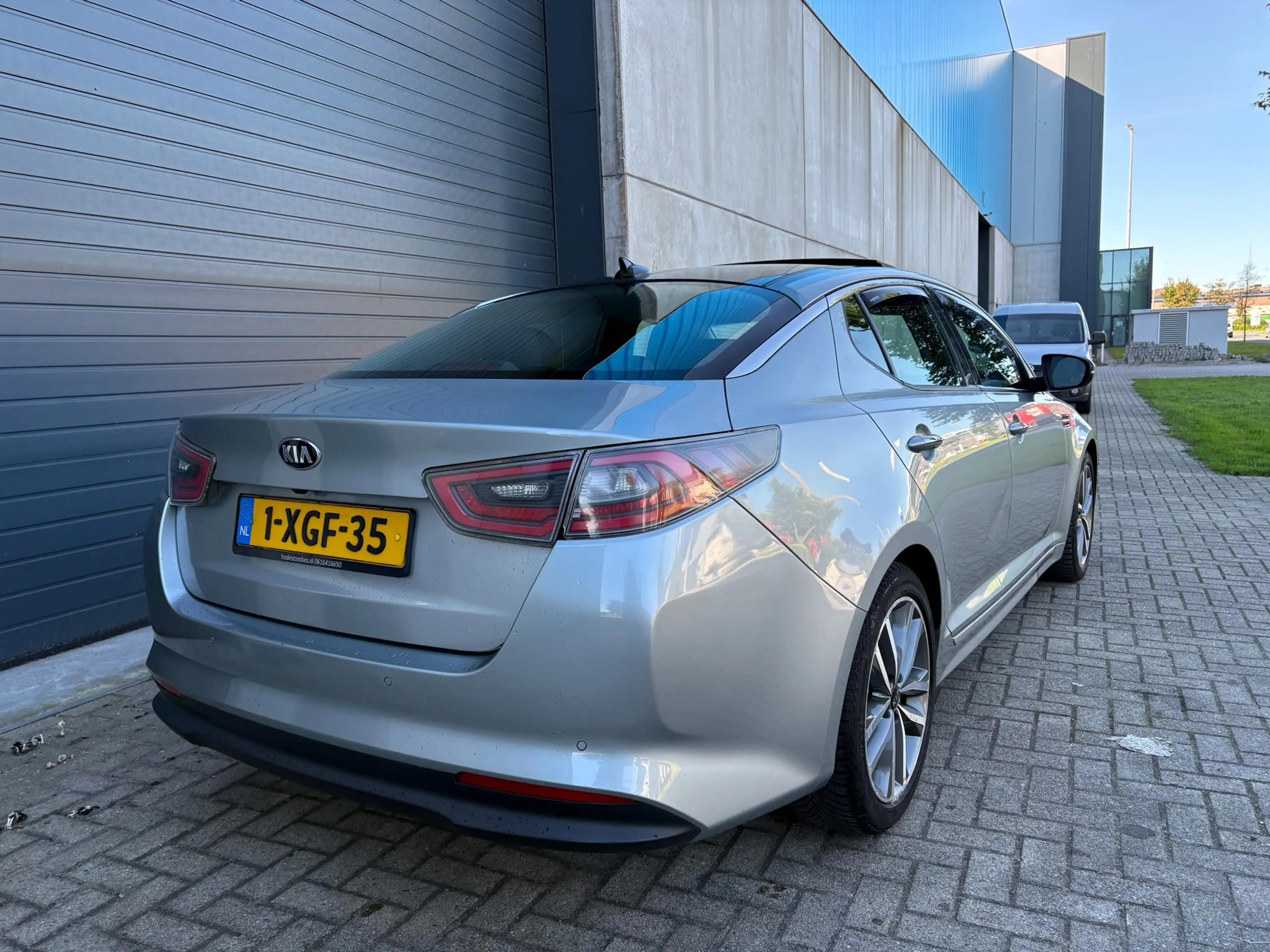 Kia Optima 2.0 CVVT Hybrid Executive Line AUT PANO LEDER — photo 3