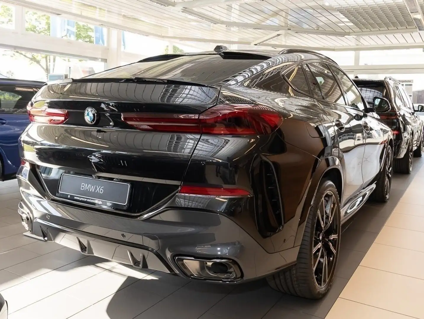 BMW X6 xDrive40d M Paket + B/W + Pano +  DA Prof Zwart - 2