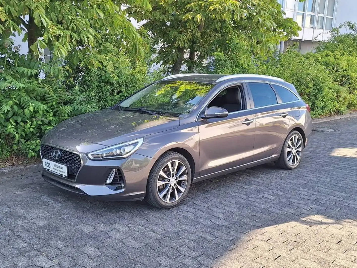 Hyundai i30 cw 1.4T DCT Premium *2.HAND*E-SITZ*NAV*STANDHEIZ*G Brun - 1