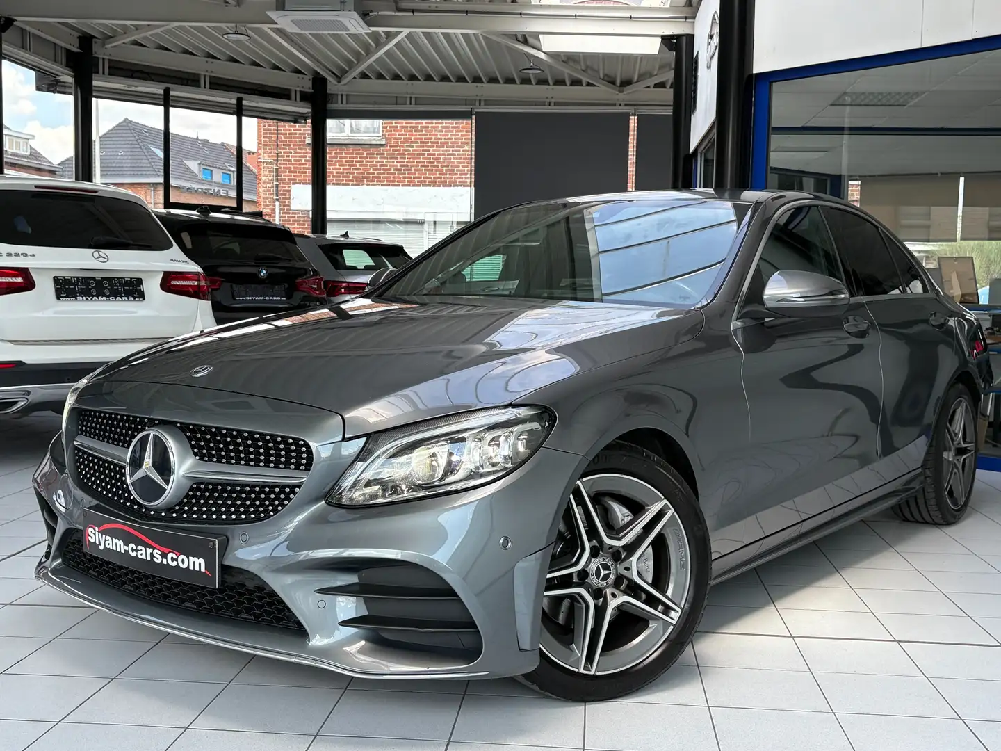 Mercedes-Benz C 200 d *AMG*COCKPIT DIGI*XENON*LED AMBI*GPS*CAMERA* Grijs - 1