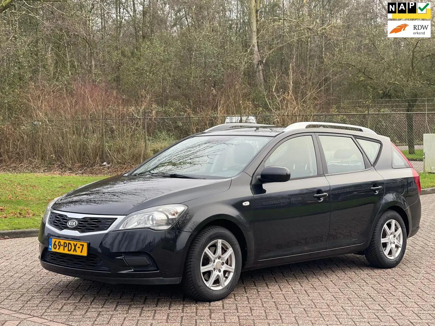 Kia Ceed / cee'd Sporty Wagon 1.4 CVVT X-tra/AIRCO/PARKEERSENS ACHT Schwarz - 1