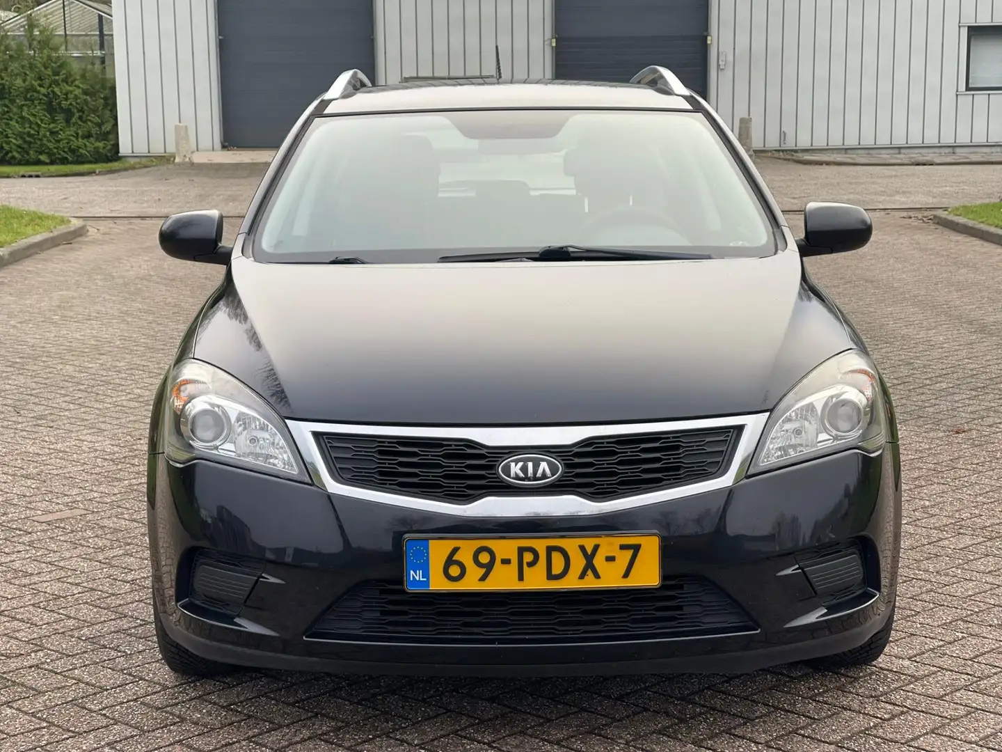 Kia Ceed / cee'd Sporty Wagon 1.4 CVVT X-tra/AIRCO/PARKEERSENS ACHT Schwarz - 2