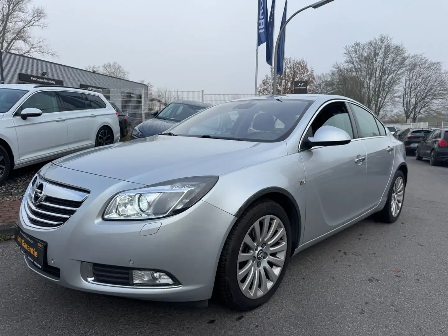 Opel Insignia 1.8/SPORT/2.HD/KLIMAAUT/NAVI/XENON/T.LEDER/PDC/ Silber - 1