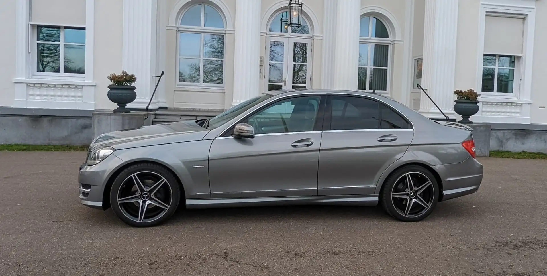 Mercedes-Benz C 180 Mercedes C180 1.6 156pk Aut7 AMG- Edition C 129000 Zilver - 2