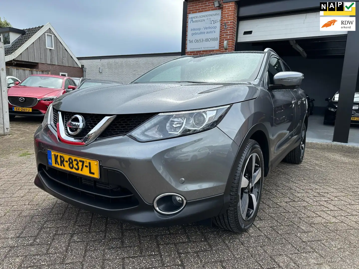 Nissan Qashqai 1.2 N-Vision AUTOMAAT-NAVI-CRUISE-ACHTERUITRIJCAME Grijs - 1