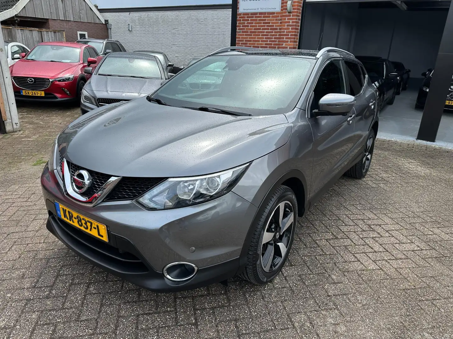 Nissan Qashqai 1.2 N-Vision AUTOMAAT-NAVI-CRUISE-ACHTERUITRIJCAME Grijs - 2