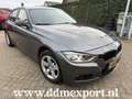 BMW 320 3-serie 320i High Executive AUT/CLIMA/NAVI/XENON - Grijs - thumbnail 1
