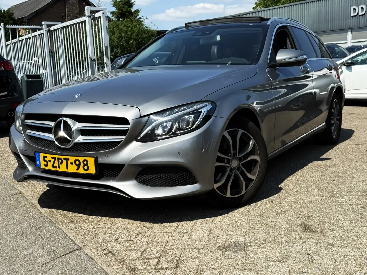 Mercedes-Benz C 200 Estate CDI Ambition NAVI/CAMERA/LEER/PANO/TREKHAAK Grijs - 1