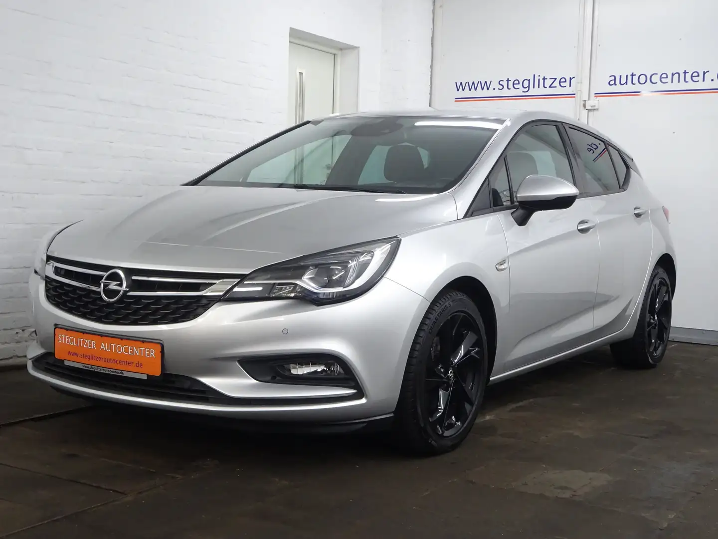 Opel Astra K 1.0 Lim. ON Navi/LED/RFK/KEY/4xSHZ/Tempo/CarPlay Zilver - 1