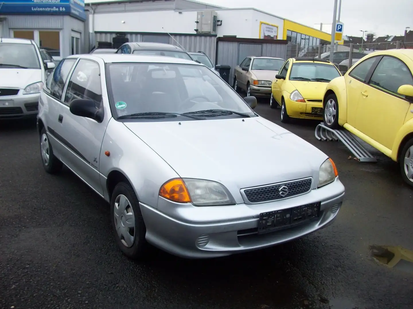 Suzuki Swift 1.0 GLS Silber - 1